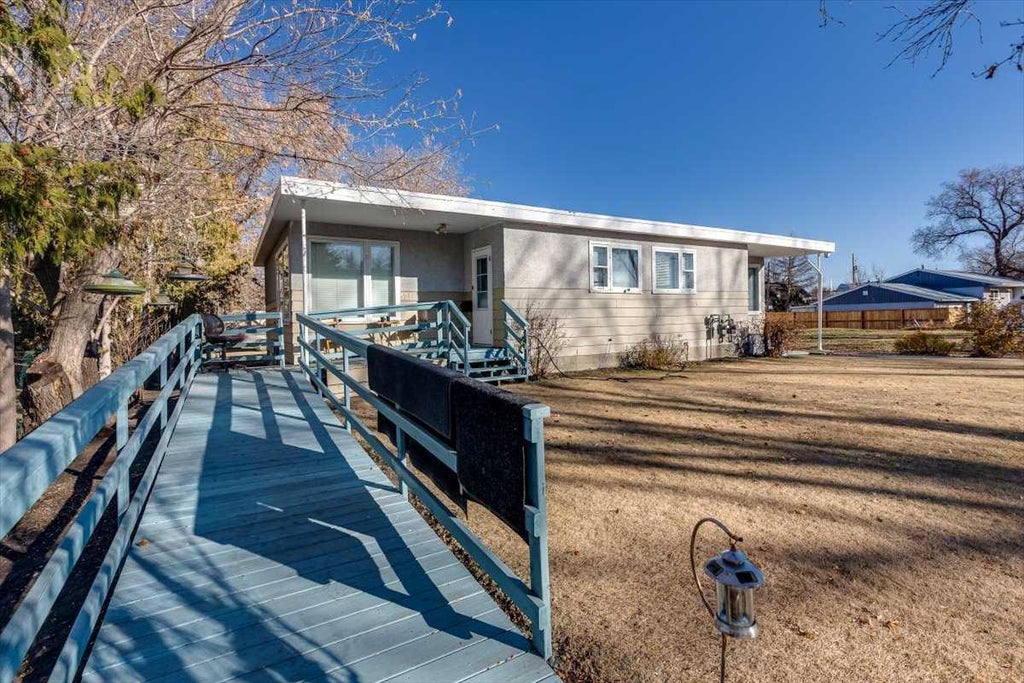 Photo of 5216 &amp; 5218 56 Avenue, Ponoka, AB T4J 1G6 (MLS # A2324348)