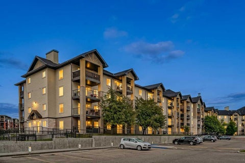 Photo of 304 Mackenzie Way SW #8223, Airdrie, AB T4B 3H6 (MLS # A2325218)