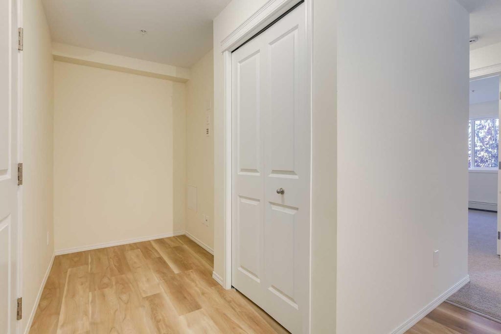 Photo of 115 Prestwick Villas SE #1210, Calgary, AB T2Z 0M8 (MLS # A2353169)