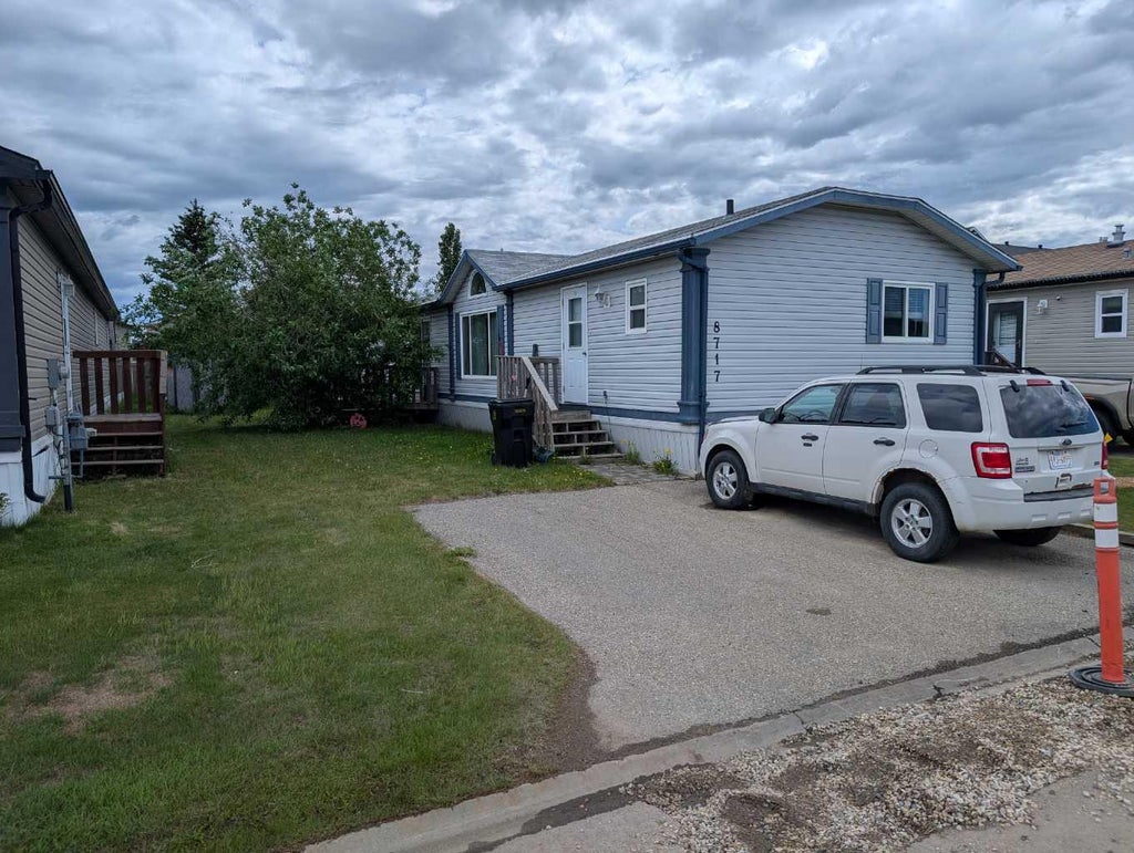 Photo of 8717 88C Street, Grande Prairie, AB T8X 0C5 (MLS # A2319123)