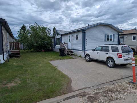 Photo of 8717 88C Street, Grande Prairie, AB T8X 0C5 (MLS # A2319123)