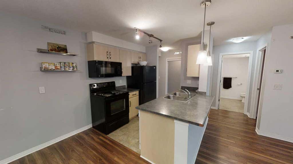 Photo of 9124 96 Avenue #112, Grande Prairie, AB T8X 0A1 (MLS # A2331515)