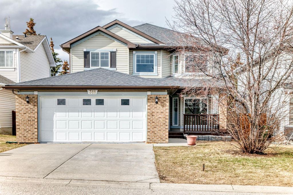 Photo of 311 Rocky Ridge Cove NW, Calgary, AB T3G 4K1 (MLS # A2300845)