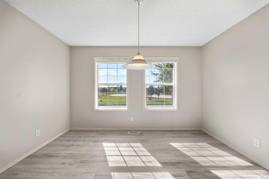 Photo of 71 Covepark Square NE, Calgary, AB T3K 5W9 (MLS # A2346230)