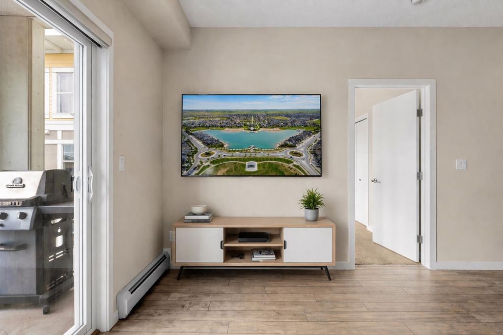 Photo of 402 Marquis Lane SE #311, Calgary, AB T3M 2G7 (MLS # A2303132)