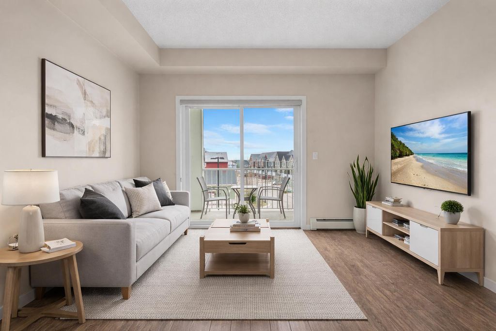 Photo of 402 Marquis Lane SE #311, Calgary, AB T3M 2G7 (MLS # A2303132)