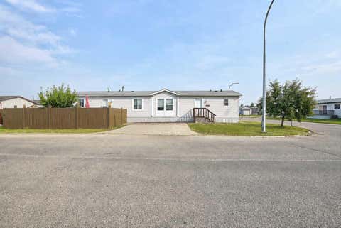 Photo of 8902 89 Street, Grande Prairie, AB T8X 0G1 (MLS # A2340102)