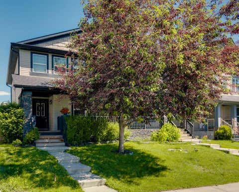 Photo of 91 Panora Square NW, Calgary, AB T3K 0R3 (MLS # A2314921)