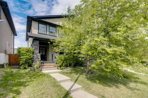 Photo of 91 Panora Square NW, Calgary, AB T3K 0R3 (MLS # A2314921)
