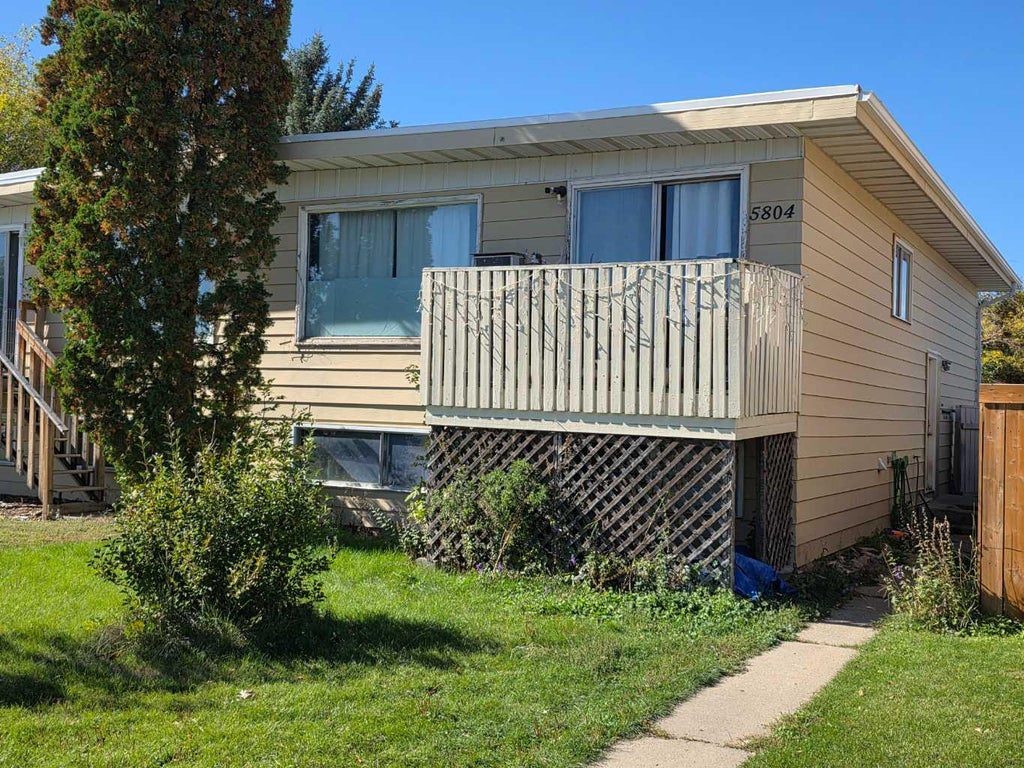 5804 48 STREET, TABER, AB T1G 1E6 - Image 946458893.jpeg?d=l