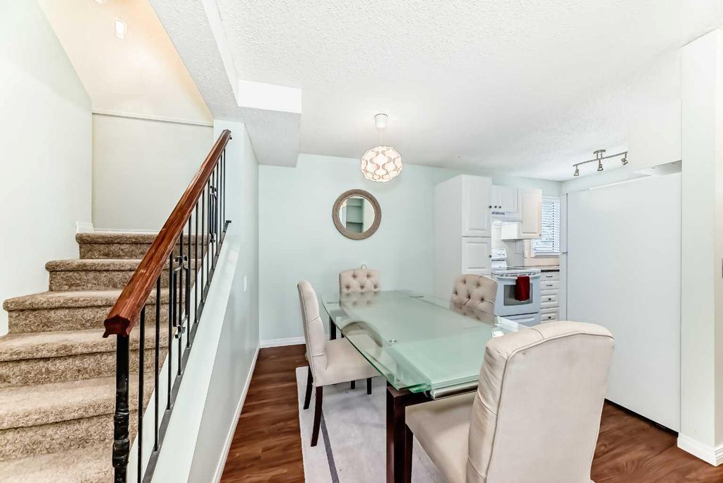 Photo of 115 Bergen Road NW #14, Calgary, AB T3K 1P2 (MLS # A2291899)