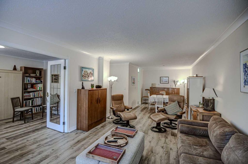 Photo of 521 57 Avenue SW #105, Calgary, AB T2V 4N5 (MLS # A2287882)