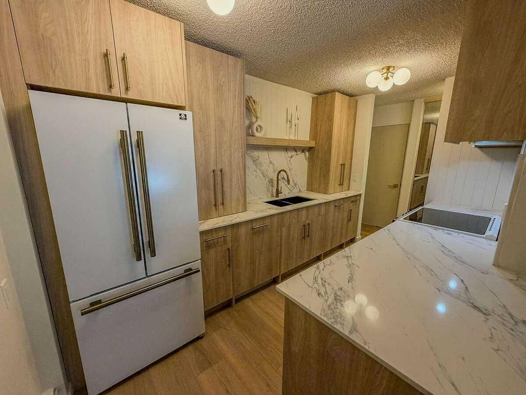 Photo of 4001B 49 Street NW #2106, Calgary, AB T3A 2C9 (MLS # A2299807)