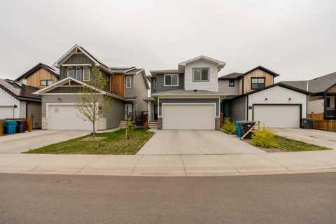 Photo of 95 Blackwolf Pass N, Lethbridge, AB T1H 7H8 (MLS # A2313309)