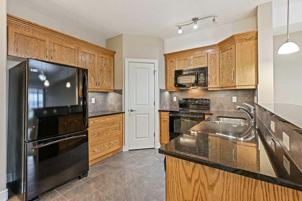 Photo of 2330 Fish Creek Boulevard SW #1243, Calgary, AB T2Y 0L1 (MLS # A2290652)