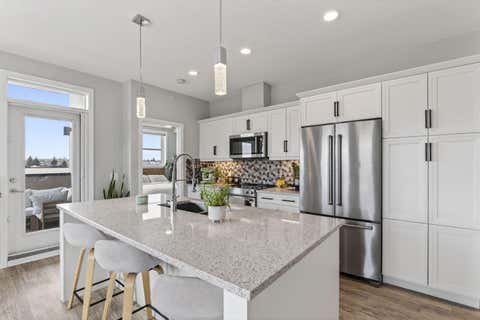 Photo of 80 Greenbriar Place NW #1402, Calgary, AB T3B 6J4 (MLS # A2330679)