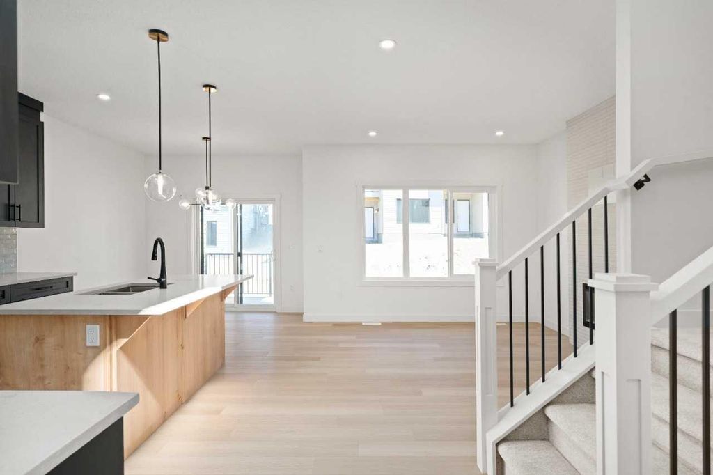 Photo of 107 Heritage Manor, Cochrane, AB T4C 3K8 (MLS # A2314960)