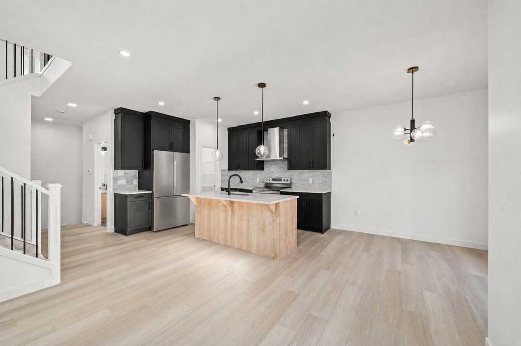 Photo of 107 Heritage Manor, Cochrane, AB T4C 3K8 (MLS # A2314960)