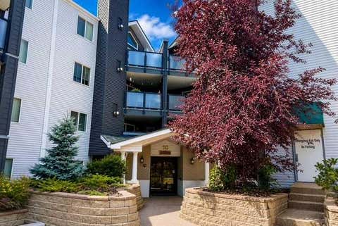 Photo of 10 Sierra Morena Mews SW #214, Calgary, AB T3H 3K5 (MLS # A2325662)