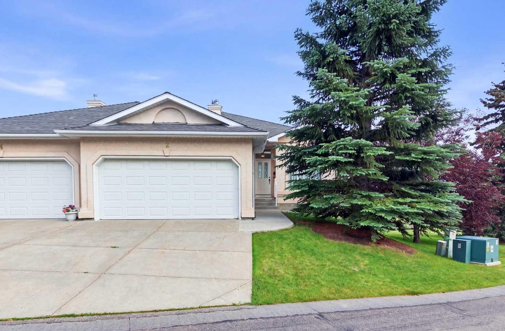 Photo of 2 Eagleview Way, Cochrane, AB T4C 1P5 (MLS # A2328457)