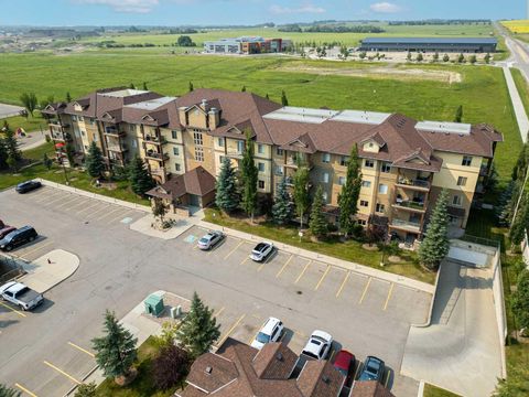 Photo of 92 Crystal Shores Road #4203, Okotoks, AB T1S 2N2 (MLS # A2331376)