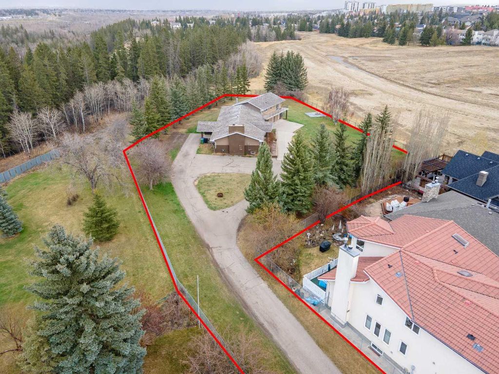 Photo of 1008 Shawnee Drive SW, Calgary, AB T2Y 2T9 (MLS # A2247245)