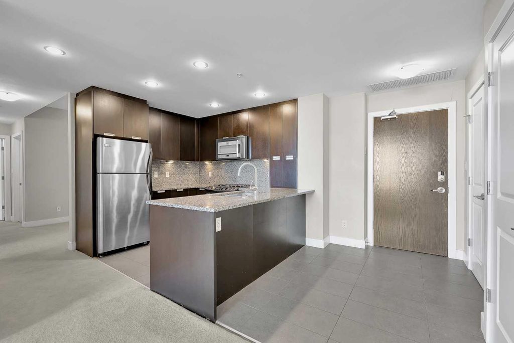 Photo of 99 Spruce Place SW #907, Calgary, AB T2V 5G5 (MLS # A2284451)