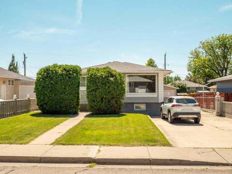 Photo of 1726 13 Avenue S, Lethbridge, AB T1K 0R9 (MLS # A2339734)