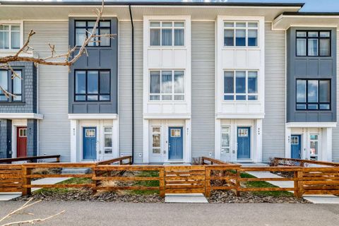 Photo of 871 Belmont Drive SW, Calgary, AB T2X 4P2 (MLS # A2306048)
