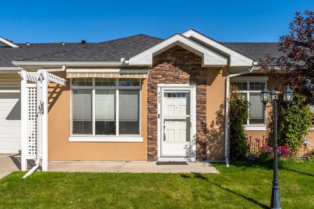 Photo of 405 Sunvale Crescent NE, High River, AB T1V 0E8 (MLS # A2348279)