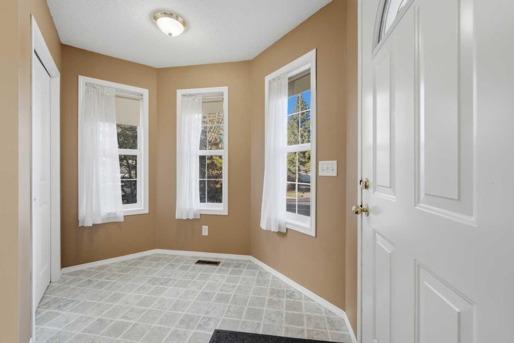 Photo of 407 Sunset Boulevard NW #A, Diamond Valley, AB T0L 2A0 (MLS # A2354968)
