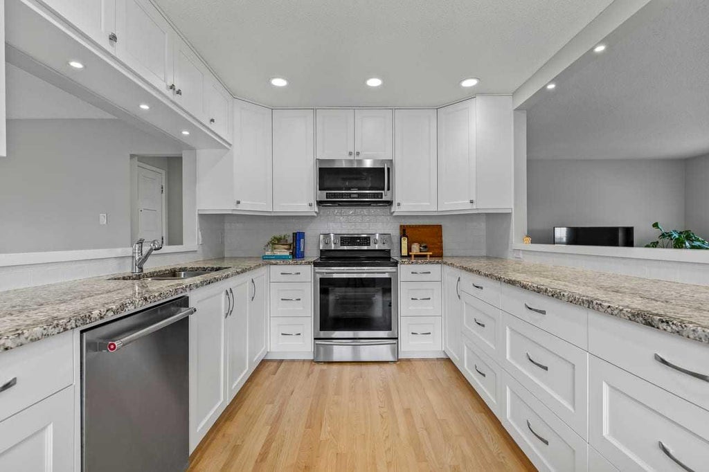 Photo of 232 Lake Wapta Rise SE, Calgary, AB T2J 2M9 (MLS # A2348897)