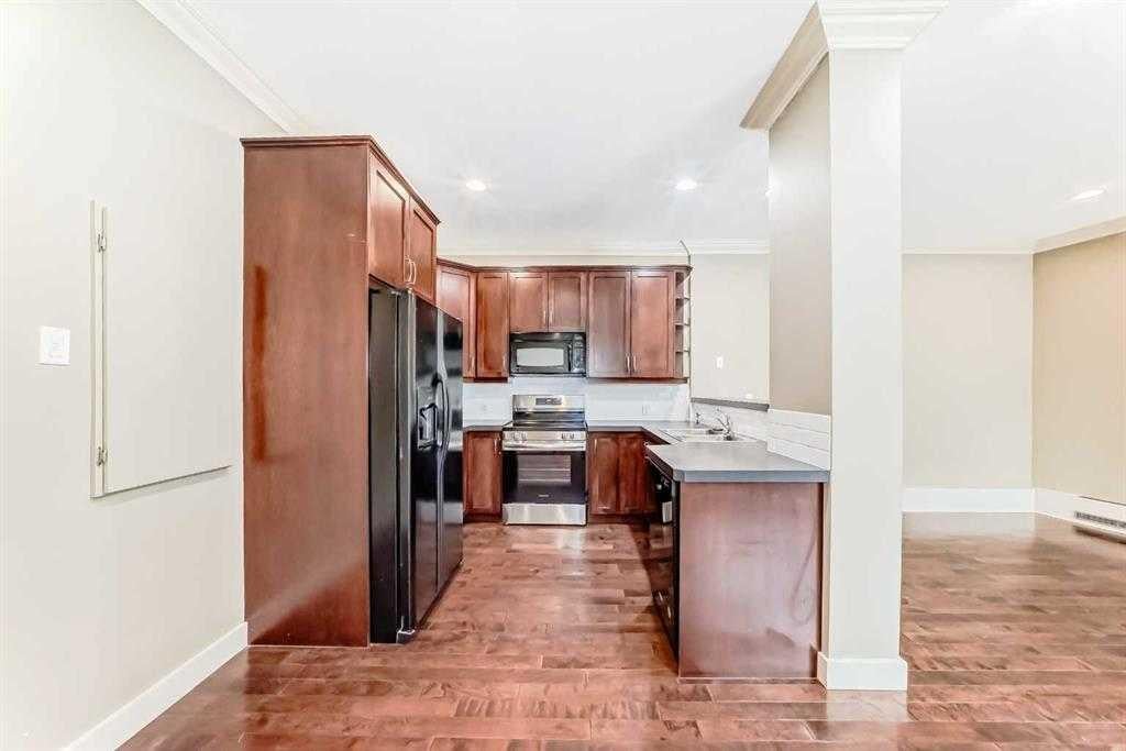 Photo of 323 13 Avenue SW #101, Calgary, AB T2R 0K3 (MLS # A2344170)