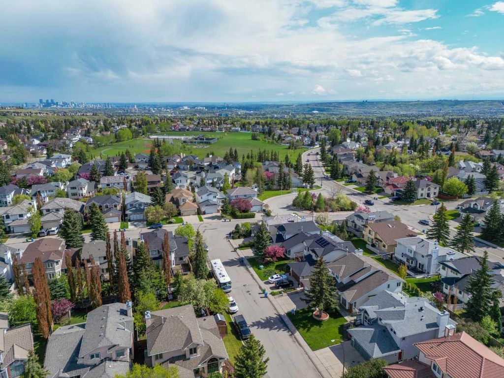 Photo of 393 Hawktree Circle NW, Calgary, AB T3G 2X9 (MLS # A2305196)