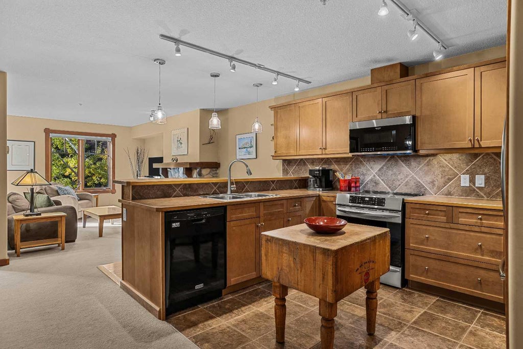 Photo of 170 Crossbow Place #314, Canmore, AB T1W 3H4 (MLS # A2349484)