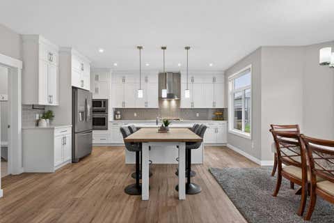Photo of 109 Kinniburgh Cove, Chestermere, AB T1X 0Y6 (MLS # A2317356)