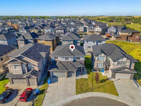 Photo of 109 Kinniburgh Cove, Chestermere, AB T1X 0Y6 (MLS # A2317356)