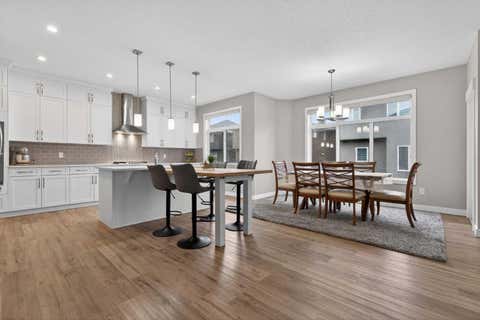 Photo of 109 Kinniburgh Cove, Chestermere, AB T1X 0Y6 (MLS # A2317356)