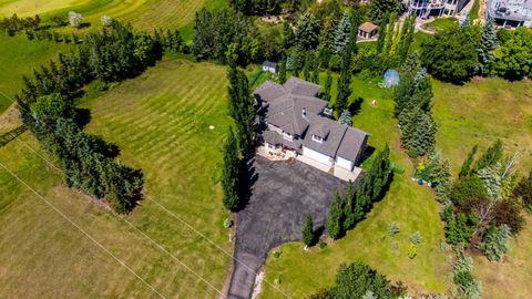 Photo of 43 Villosa Ridge Drive NW, Rural Rocky View County, AB T3Z 3B1 (MLS # A2326328)