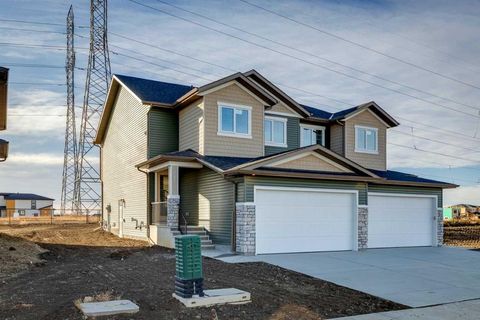 Photo of 311 Dawson Dock Way, Chestermere, AB T1X 2X4 (MLS # A2268583)