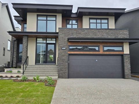 Photo of 1436 Coopers Landing SW, Airdrie, AB T4B 4J4 (MLS # A2318171)