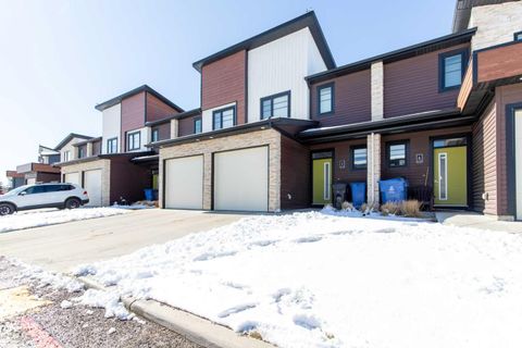 Photo of 418 Highlands Boulevard W #5, Lethbridge, AB T1J 5K5 (MLS # A2297548)