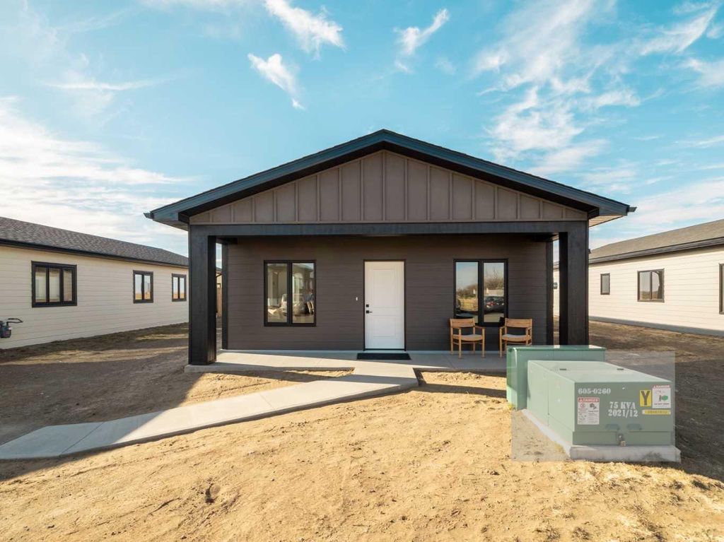 Photo of 7038 48 Street, Taber, AB T1G 0G7 (MLS # A2294511)