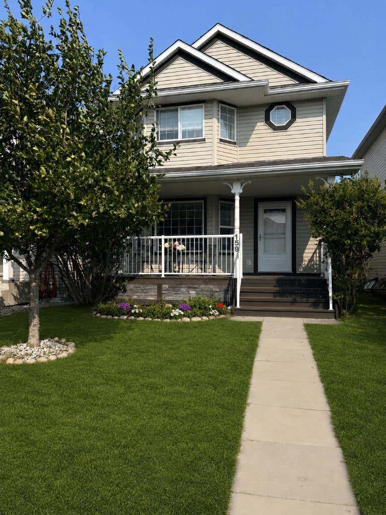 Photo of 159 Cimarron Grove Crescent, Okotoks, AB T1S 2E3 (MLS # A2339070)
