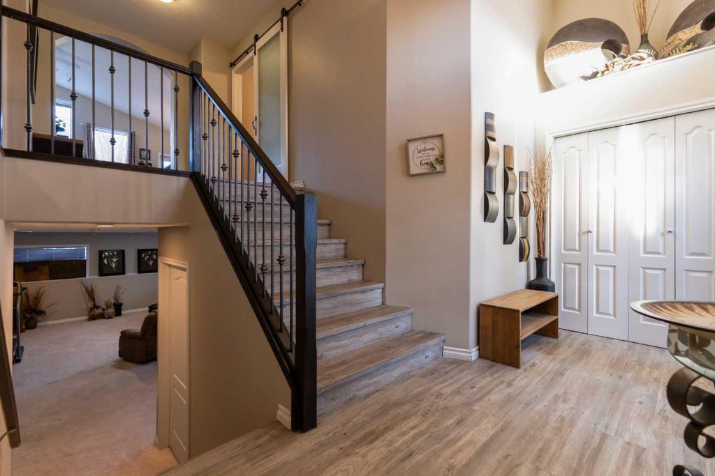 Photo of 65 Heritage Circle W, Lethbridge, AB T1K 7T3 (MLS # A2289412)