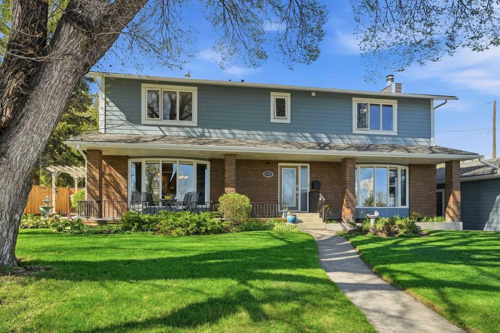 Photo of 4108 Gatefield Avenue SW, Calgary, AB T3E 4C5 (MLS # A2311873)
