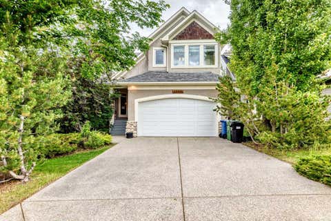 Photo of 1748 Hidden Creek Way NW, Calgary, AB T3A 6H5 (MLS # A2322225)