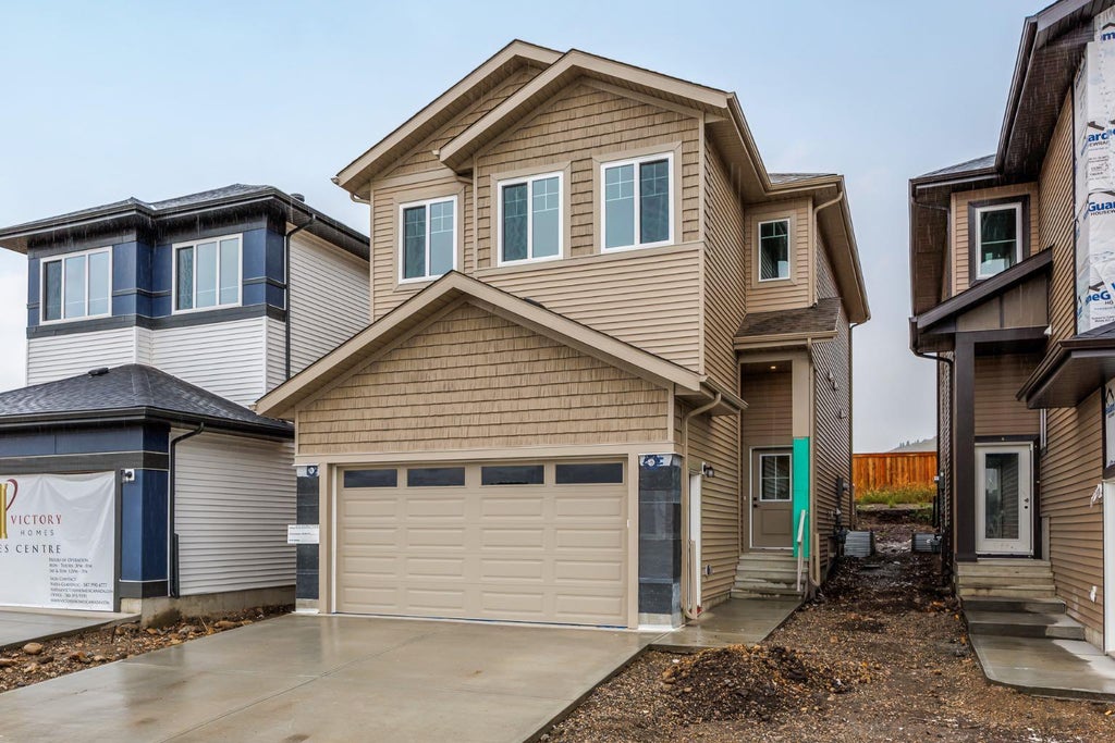 Photo of 65 Topaz Place, Cochrane, AB T4C 3P1 (MLS # A2344867)