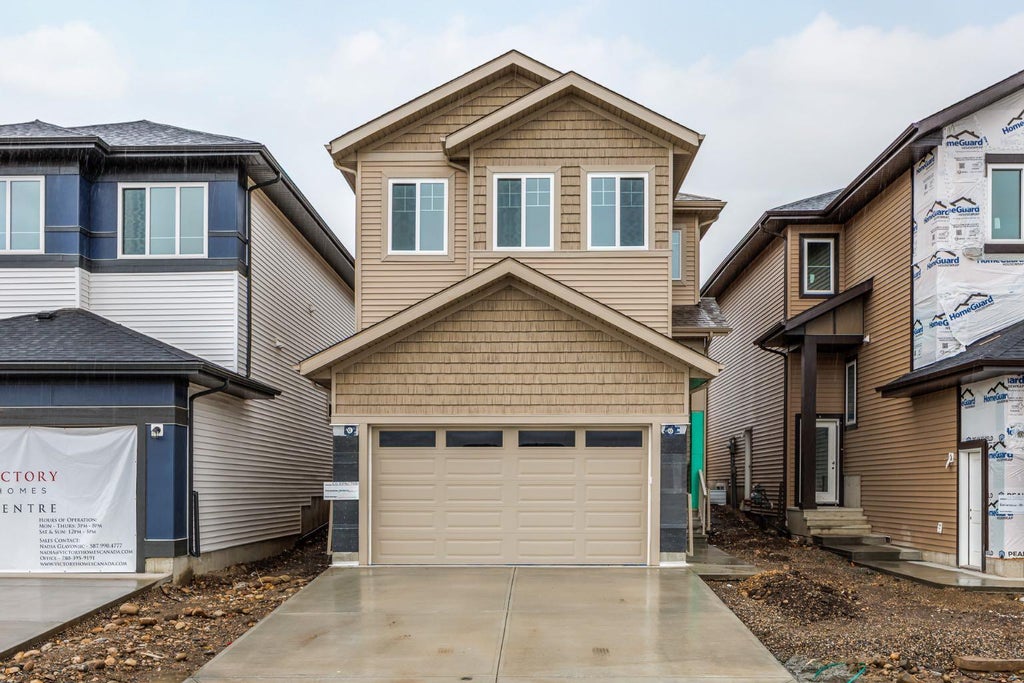 Photo of 65 Topaz Place, Cochrane, AB T4C 3P1 (MLS # A2344867)