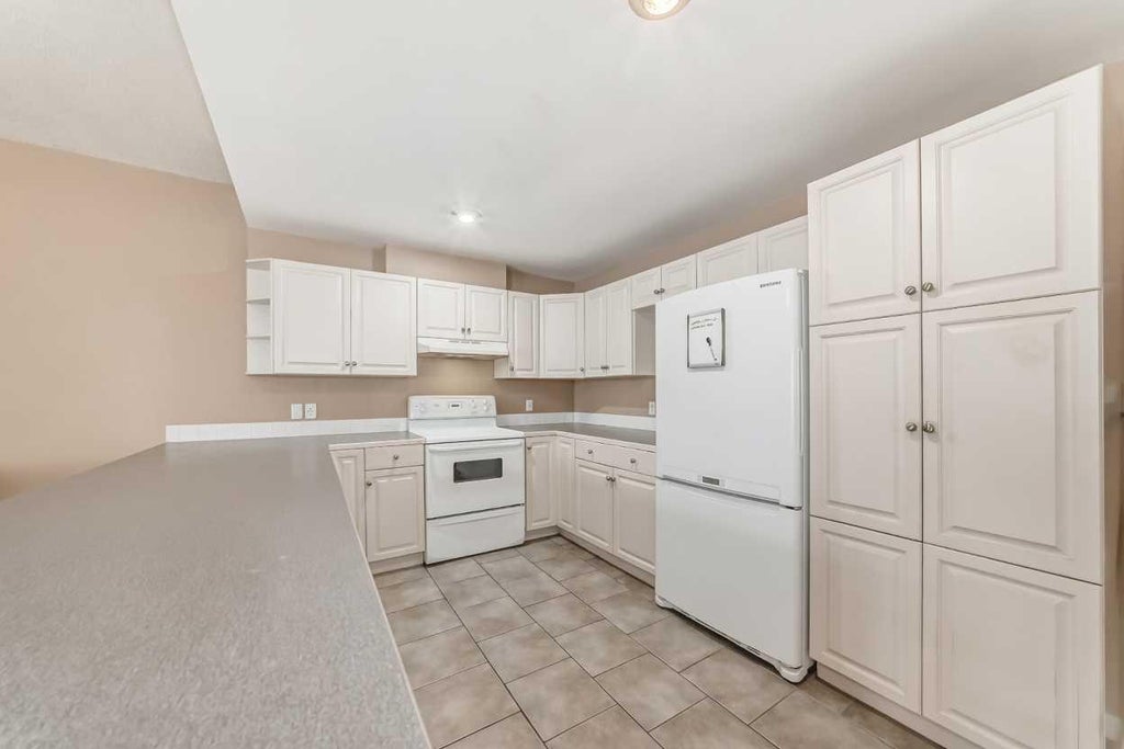 Photo of 1922 9 Avenue SE #6, Calgary, AB T2G 0V2 (MLS # A2329603)